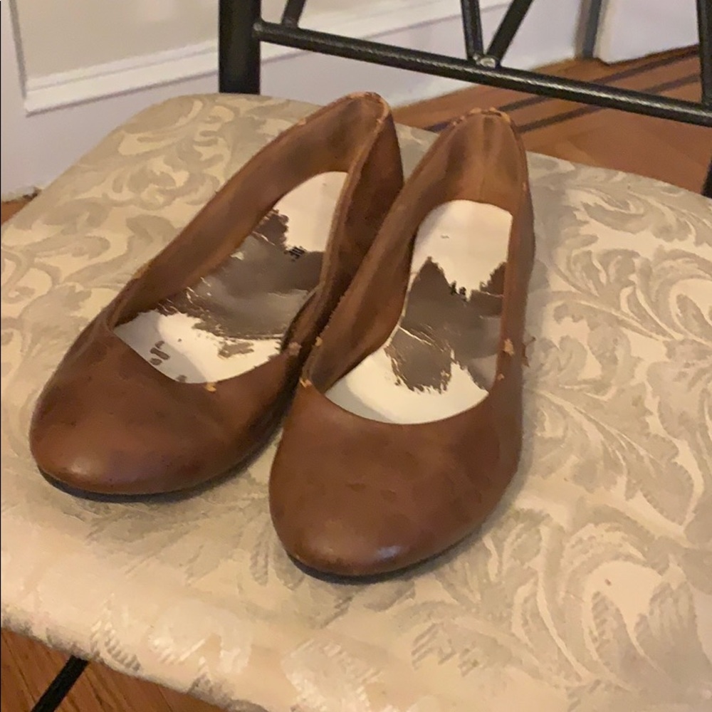 Brown leather flats